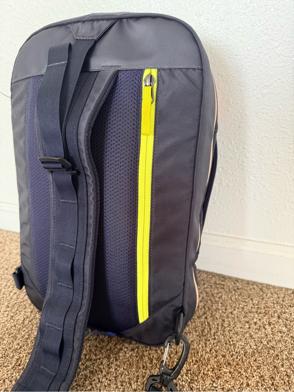 cotopaxi Black Sling Backpack with Blue Piping and Red Zip Pull - Picture 3 of 10
